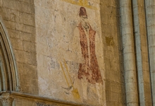Wall painting of Robert or 'Old' Scarlett, a gravedigger of renown at the Cathedral in the 16th century. He buried Katherine of Aragon and Mary Queen of Scots and died at the ripe old age of 94.